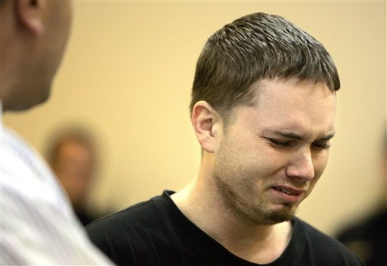 Steven Nicholson, accused of killing his two children, Ella Stafford and Jonathon Sanderlin, looks on during his arraignment at 24th District Court in Allen Park, Mich., on Oct. 22, 2010. A medical examiner says the two toddlers probably drowned before their bodies were scalded with hot water.